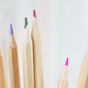 brown wooden pencils on white surface