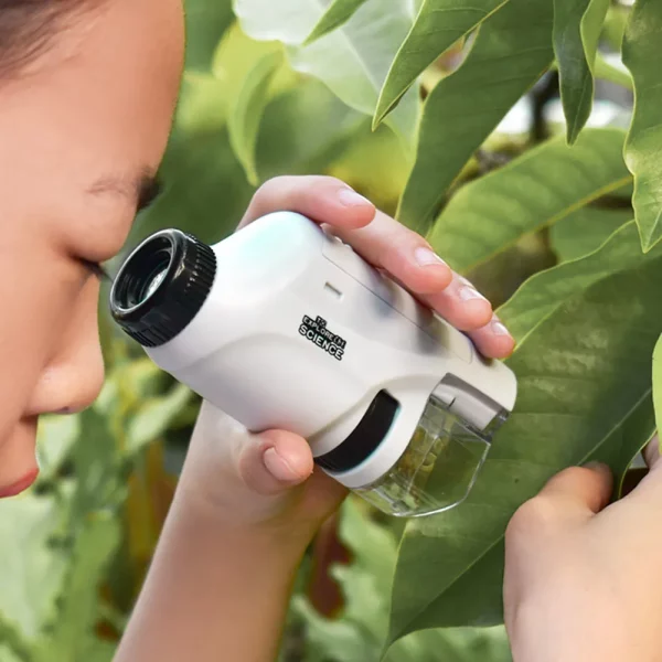Mini microscope de poche pour enfants avec grossissement 60X-120X et lumière LED intégrée. Portable, éducatif et facile à utiliser, idéal pour explorer le monde microscopique !