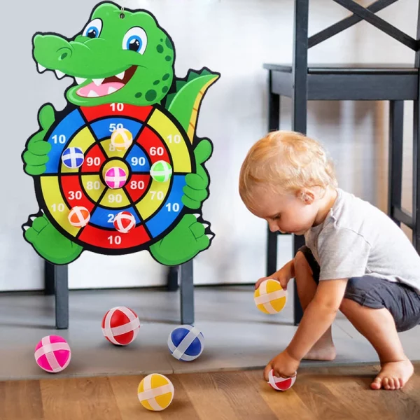Jeu de fléchettes boules en Velcro pour enfants de 2 à 7 ans, idéal pour développer la motricité et la coordination en toute sécurité. Parfait pour jouer en intérieur.